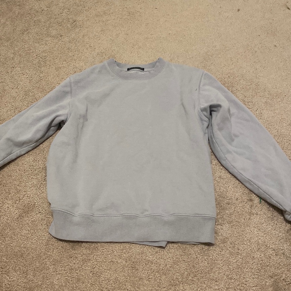 Brandy Melville, light blue sweatshirt.